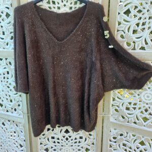 Pull pailleté avec 3 broches bijoux